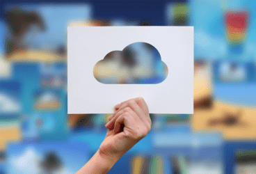 Hand holding a white paper with a cloud in it. Click to check SimScale Solutions